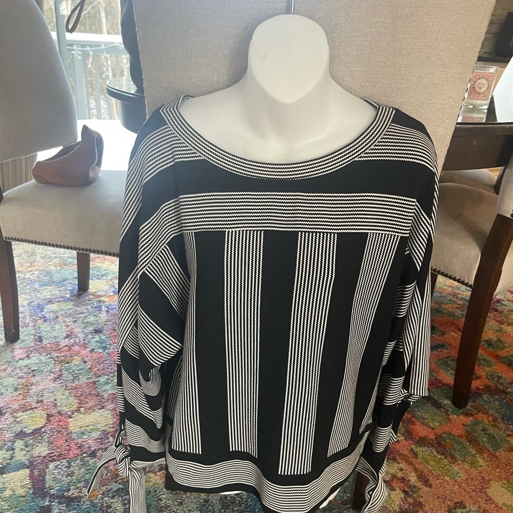 BCBGMAXMaria black and white striped top with open sleeve wrist tie detail